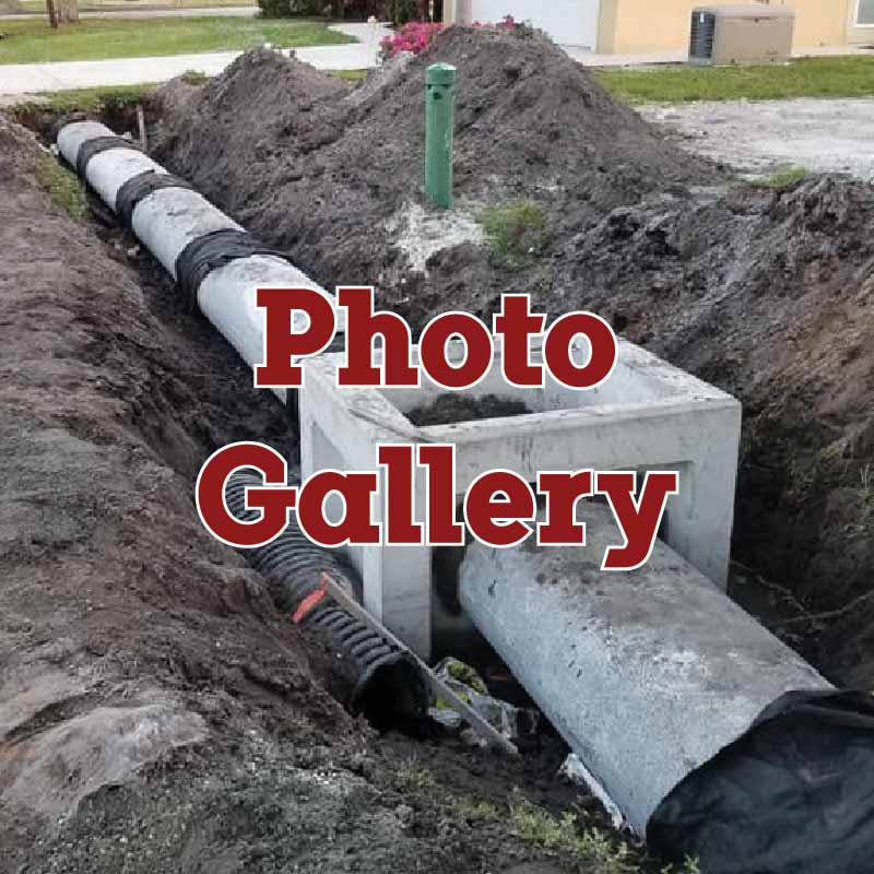 image of graded soil leading up to the garage of a house on an elevated pad